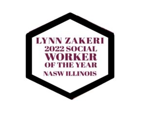 A badge that says lynn zakeri 2 0 2 2 social worker of the year in purple.